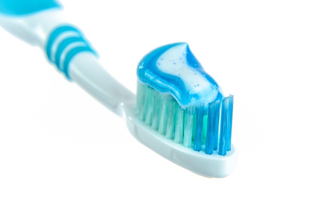 blue white bristle plastic brush with gel