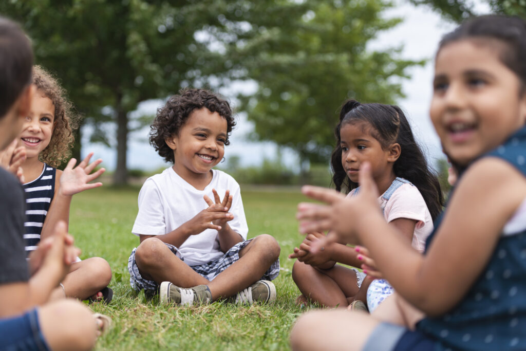 Group Of Young Children Are Playing Outside