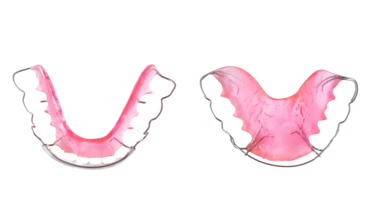 Set of pink wired Hawley Retainers on a white background